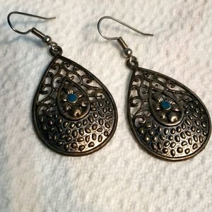 Earrings with blue embellishment